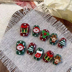 Santa‘s Carousel Press On Nails - Rotating Holiday Motifs on Classic Red & Green (10Pcs)