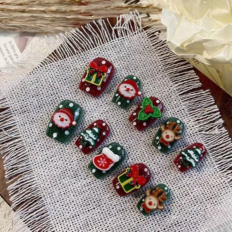 Santa‘s Carousel Press On Nails - Rotating Holiday Motifs on Classic Red & Green (10Pcs)