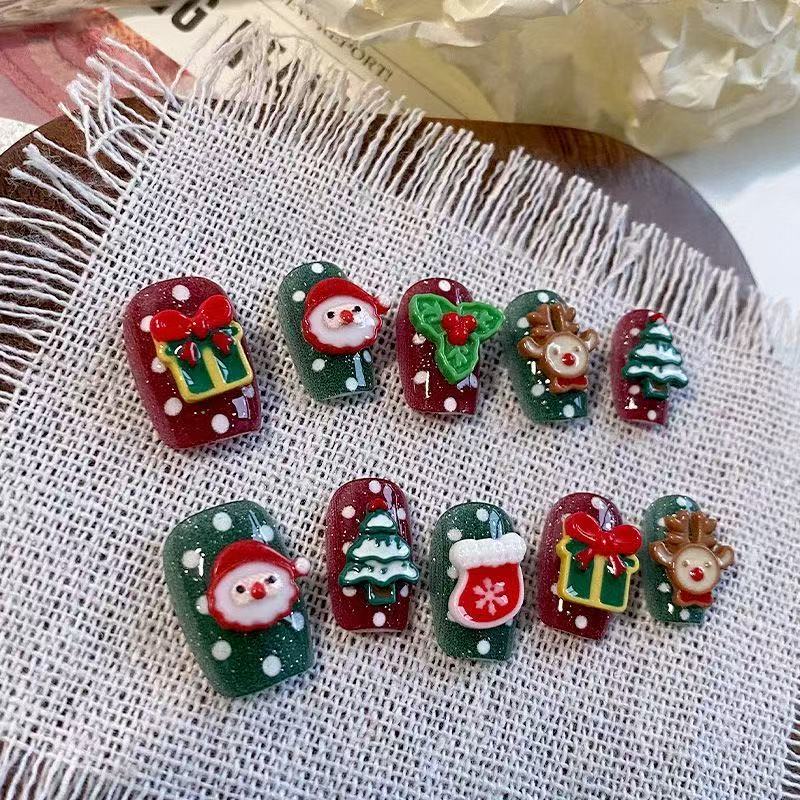 Santa‘s Carousel Press On Nails - Rotating Holiday Motifs on Classic Red & Green (10Pcs)